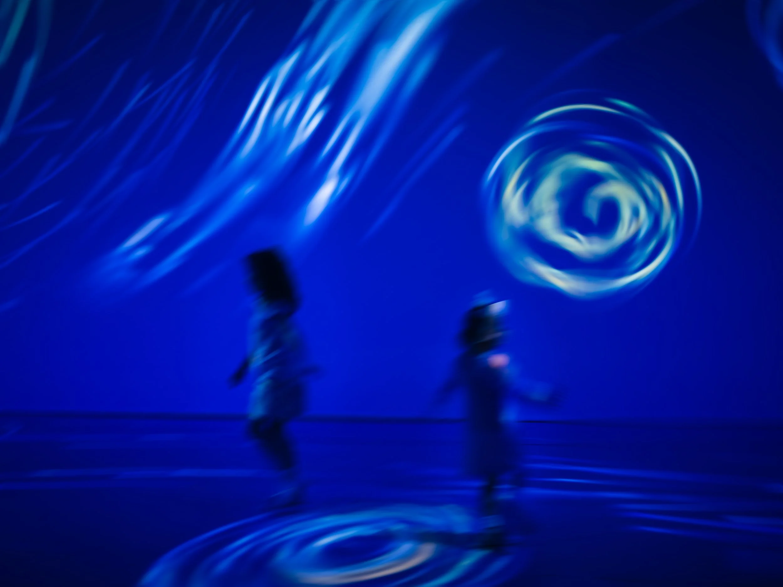 Children Dancing in Blue Light