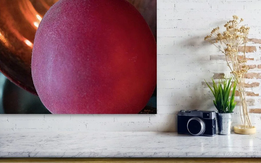 Velvet and Glass, close-up detail of the fine art print above a marble ledge with a camera and a plant