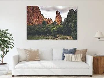 Passage Into Silence – fine art photograph of a sandstone spire at Garden of the Gods, Colorado, framed by rock formations and juniper under a diffuse sky