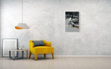Dressed for Winter fine art print displayed above a yellow chair and small table