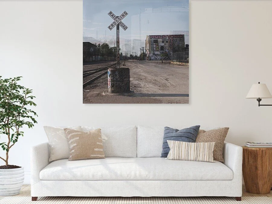 Sofa: What the Crossing Remembers fine art print framed above a sofa in a living room