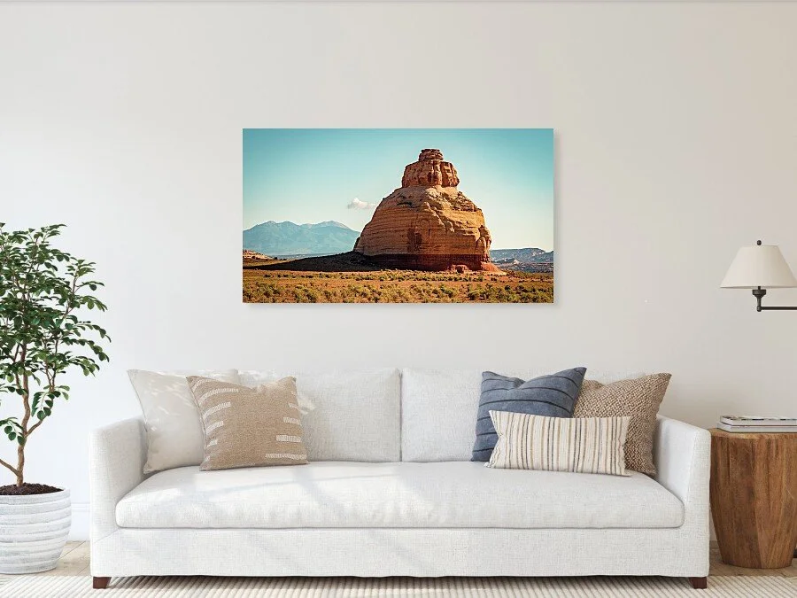 Hours in Stone fine art print framed above a sofa in a living room