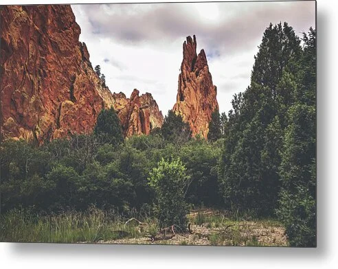 Passage Into Silence – fine art photograph of a sandstone spire at Garden of the Gods, Colorado, framed by rock formations and juniper under a diffuse sky