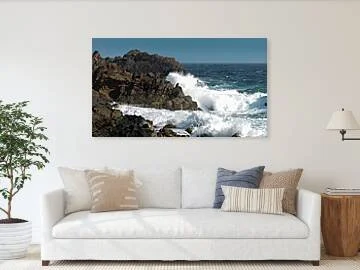 Salt and Stone, Aruba (Panorama) fine art print framed above a sofa in a living room