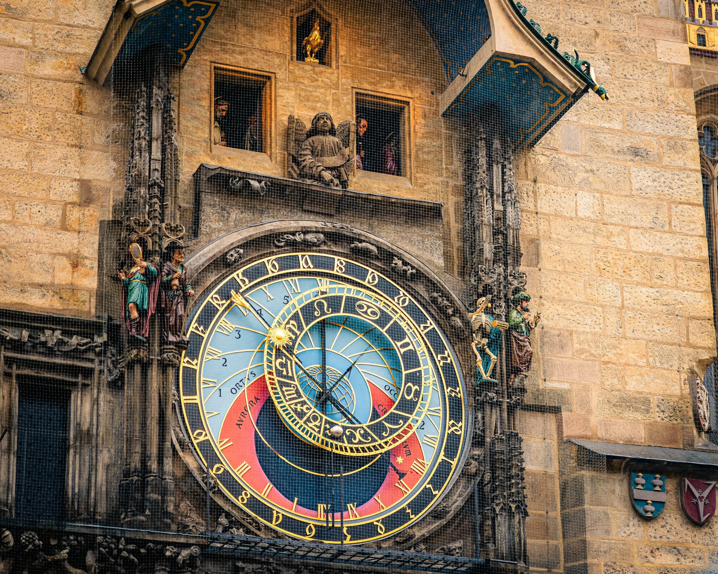 Prague's Astronomical Clock displays the hourly procession of figures above the historic clock face in Prague's Old Town Square.