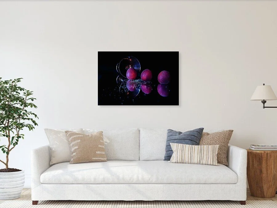 three-plums-after-dark-still-life-fine-art-print-robert-niemeier-4.jpg	Three Plums, After Dark fine art print framed above a sofa in a living room