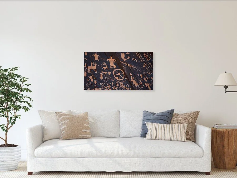 Before the Alphabet fine art print framed above a sofa in a living room