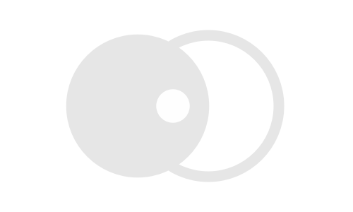Close-up of two light bulbs, one turned on and one turned off, against a black background.