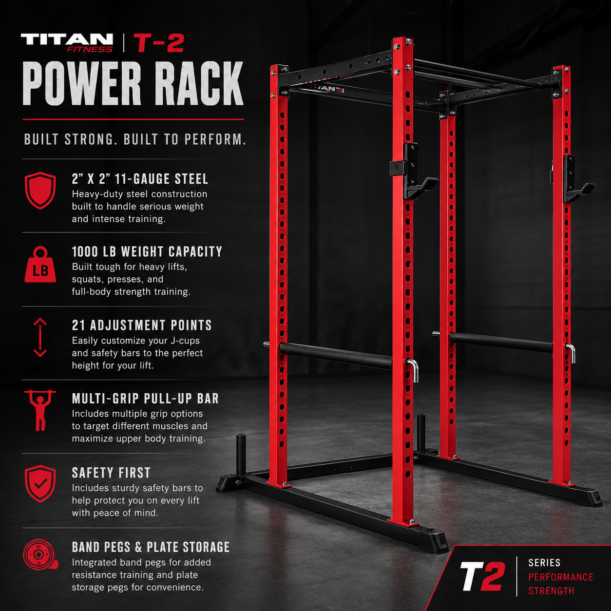 Red and black Titan T-2 power rack with adjustable J-cups, safety bars, multi-grip pull-up bar, and band pegs, displayed in a gym setting.