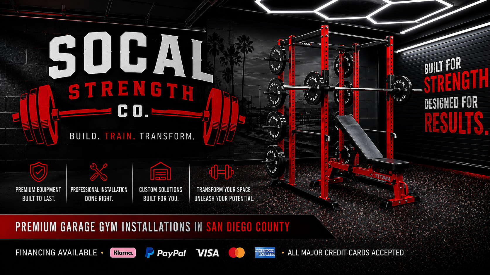 An indoor gym with black walls and ceiling, illuminated by modern geometric lighting. The gym features a red power rack with barbells and weight plates, accompanied by a black exercise bench. On the wall, there are bold white and red texts and graphics promoting strength training, including the words 'SOCAL' and 'STRENGTH.' The signage highlights premium gym installations, custom solutions, and financing options available in San Diego County, with logos for payment methods like PayPal, Visa, Mastercard, and American Express.