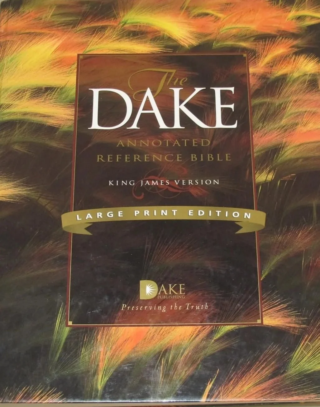 Cover of a large print edition annotated reference Bible titled 'The Dake Annotated Reference Bible, King James Version,' with a colorful background of wheat or grass and the logo of Dake Publishing at the bottom.