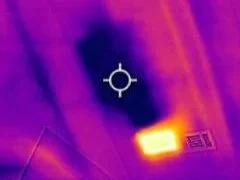 A thermal image indicating missing inslulation in a ceiling