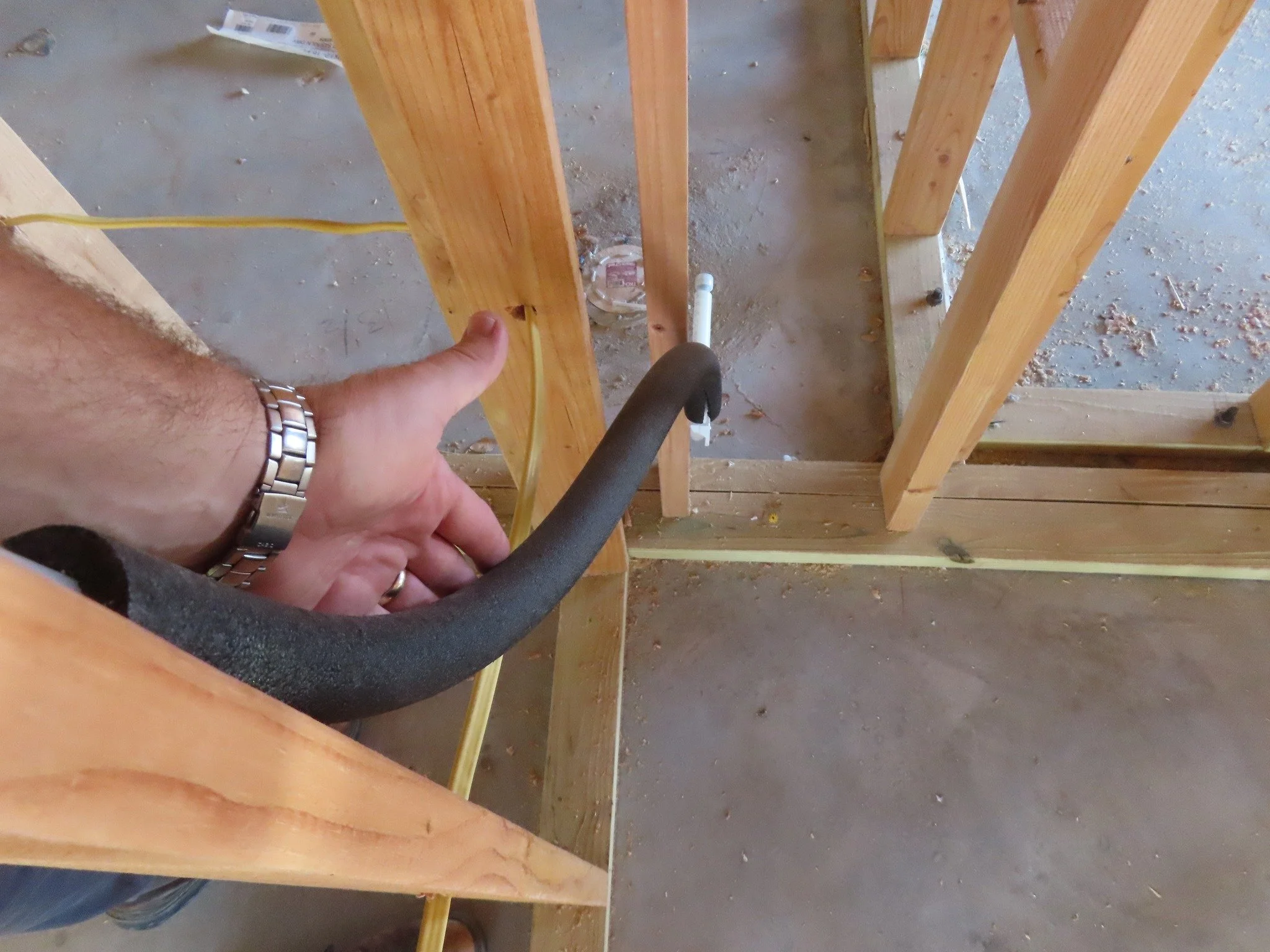 Adventures in Inspections...

When the plumber forgets a step in routing a water line.  It's supposed to go inside the studs not through the closet.

Phase inspections are vital steps during the construction process.  It allows a professional inspect