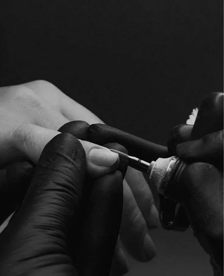 Expert Russian Manicure technique in progress, focusing on meticulous E-file cuticle prep and structured gel application.