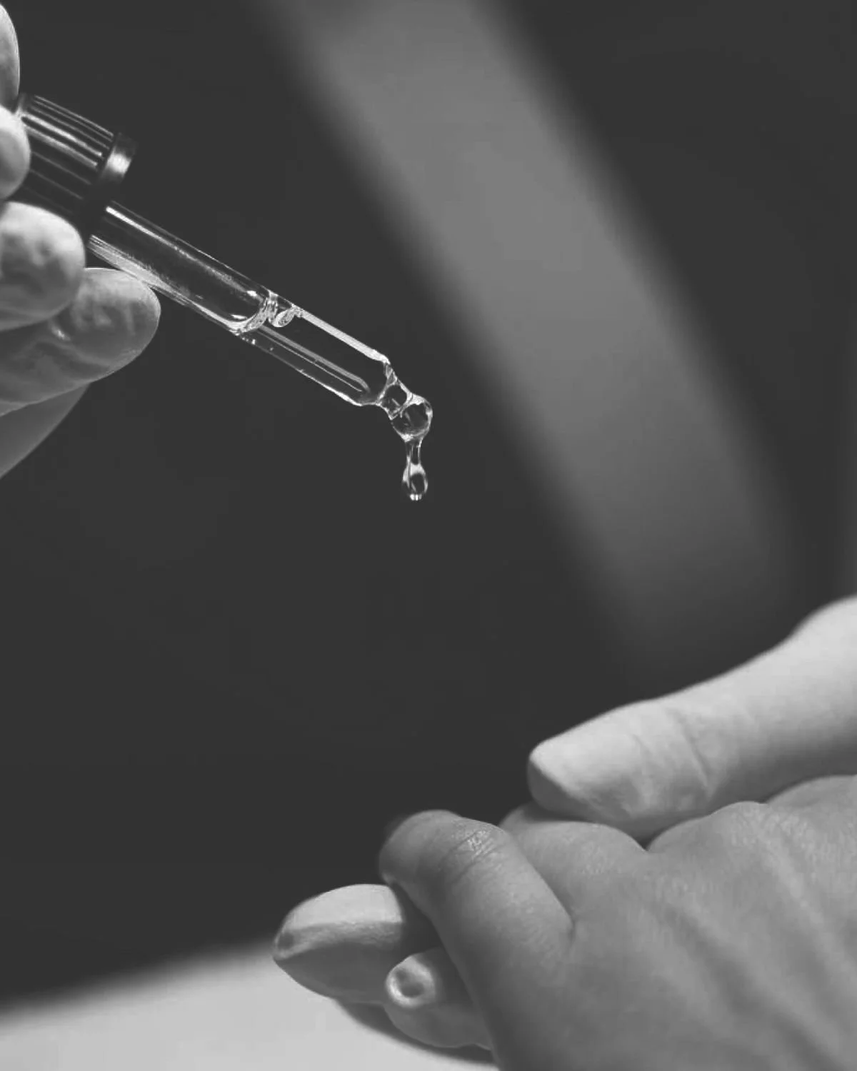 close-up of premium cuticle oil application, part of the  skincare integration at our Peachtree City luxury nail suite.