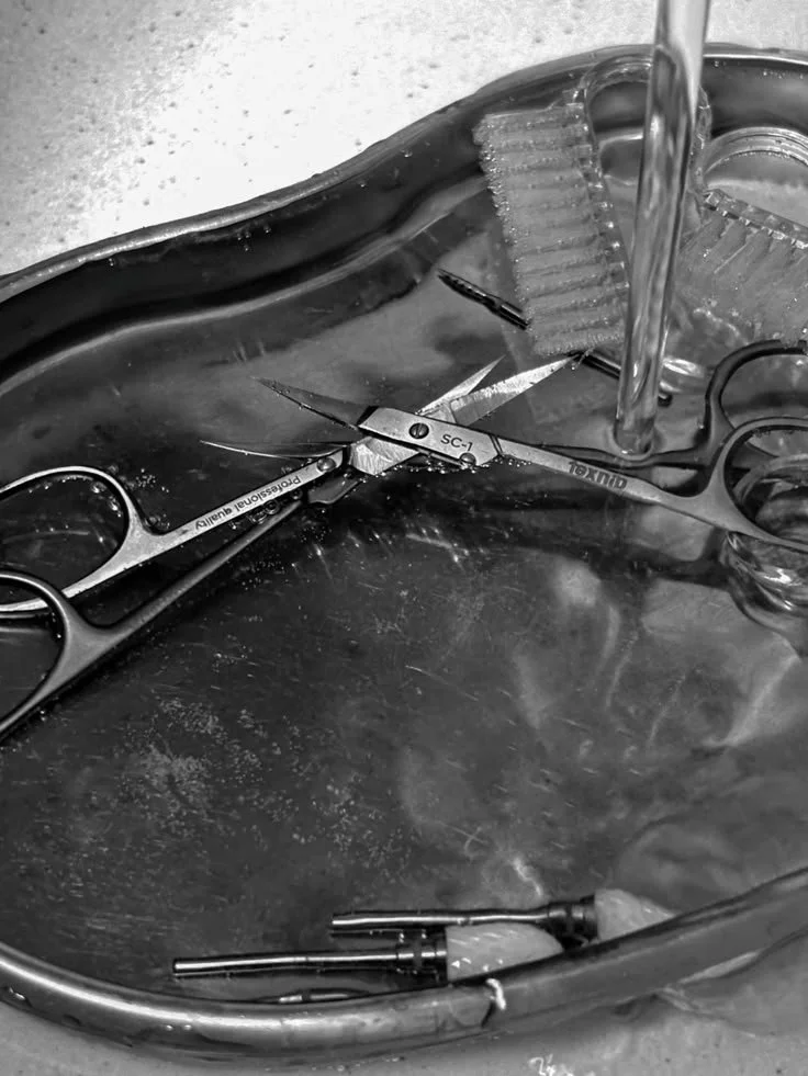Clinical-grade sterilization at The Private Suite: Stainless steel precision tools for Russian Manicures in a surgical tray.