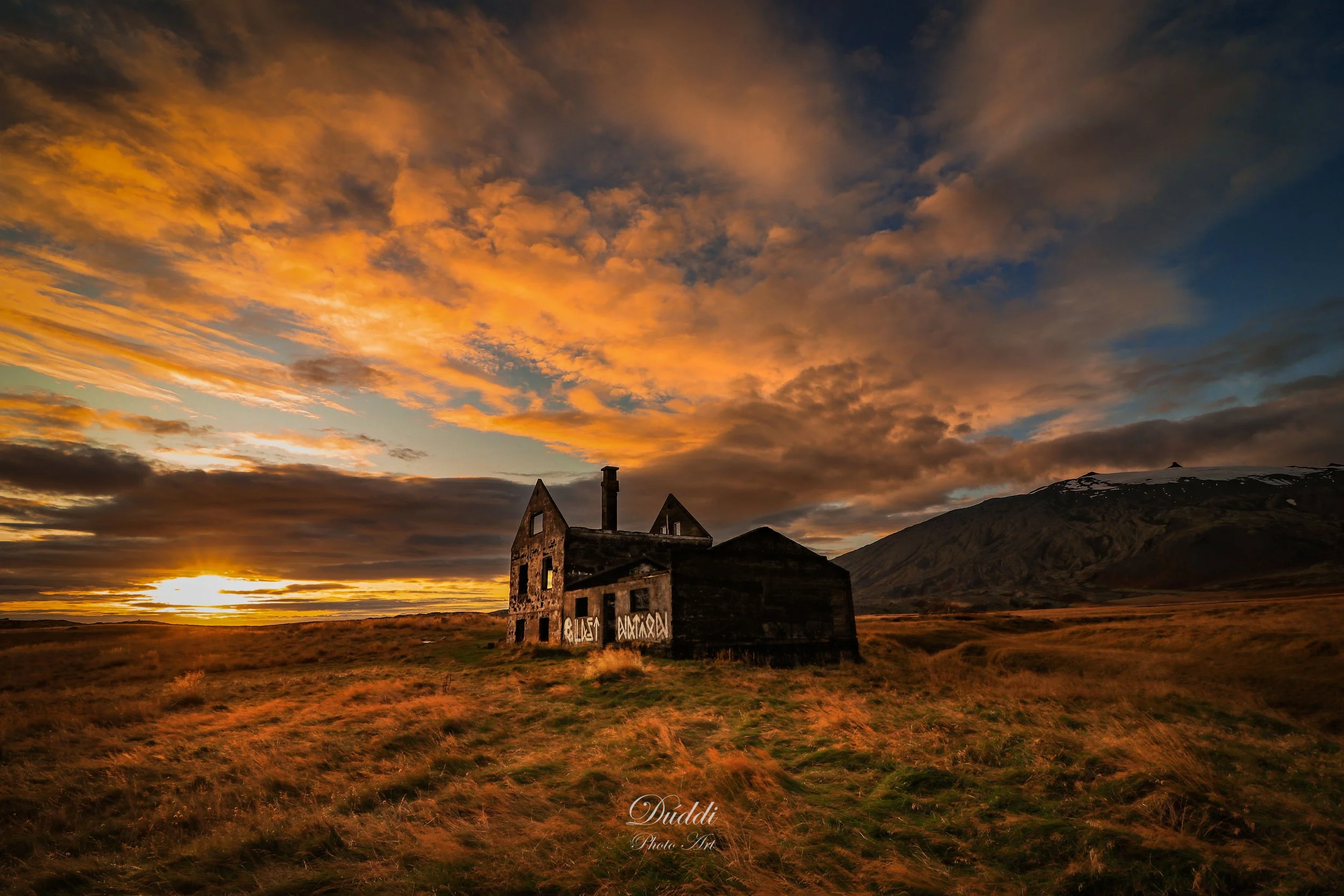 Ruins of an old farm in Snæfellsnes, Iceland, in a sunset.