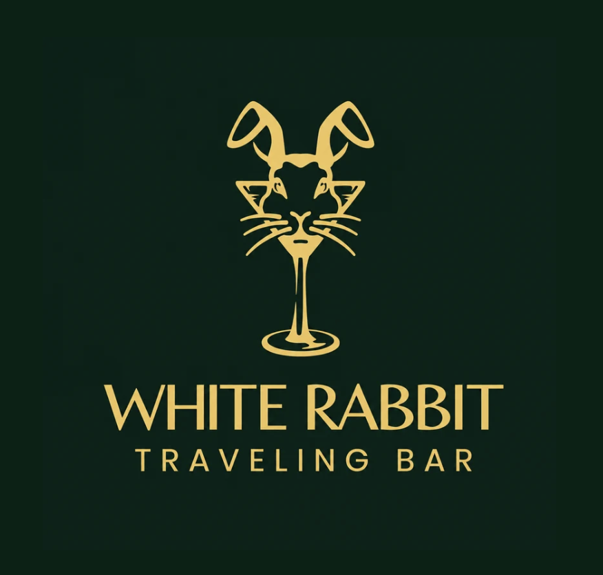 Logo for White Rabbit Traveling Bar with a gold outline of a rabbit's face merging into a wine glass, on a dark green background.