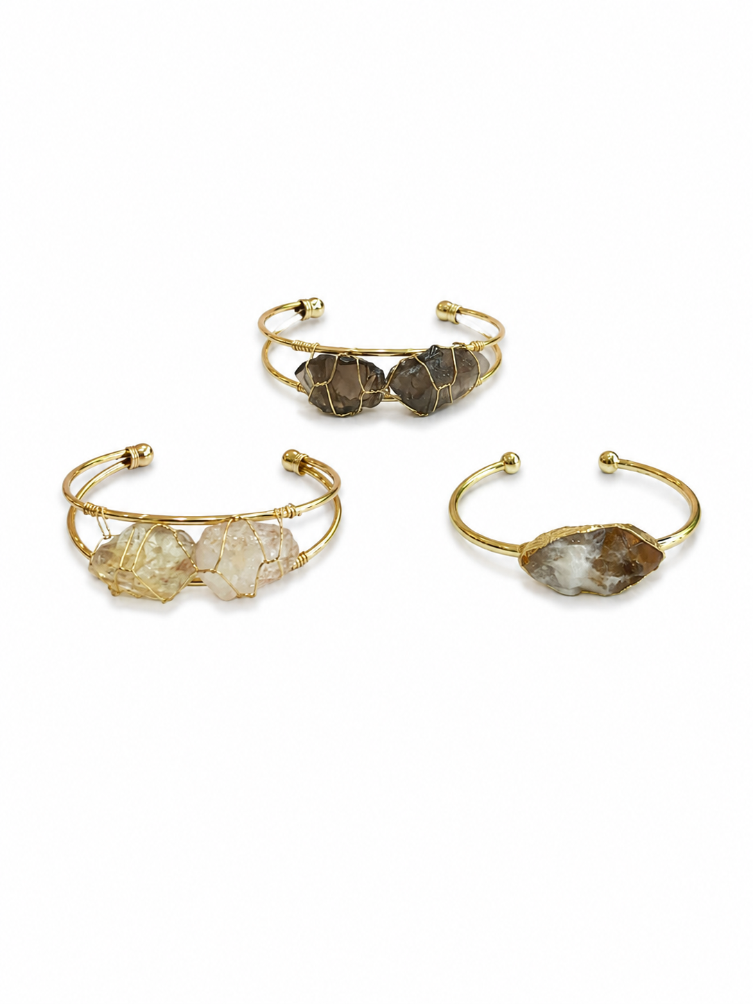 gold bracelets.png