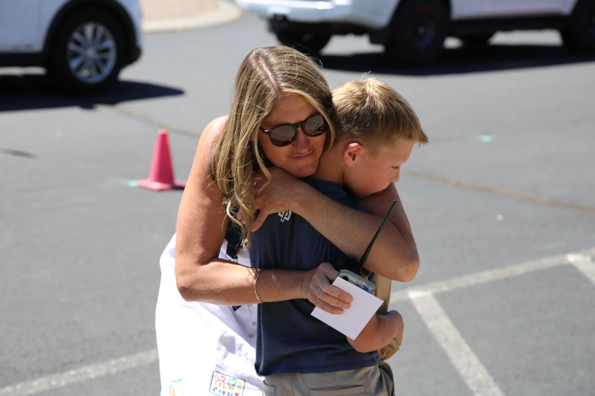 A Trinity mom hugging her son