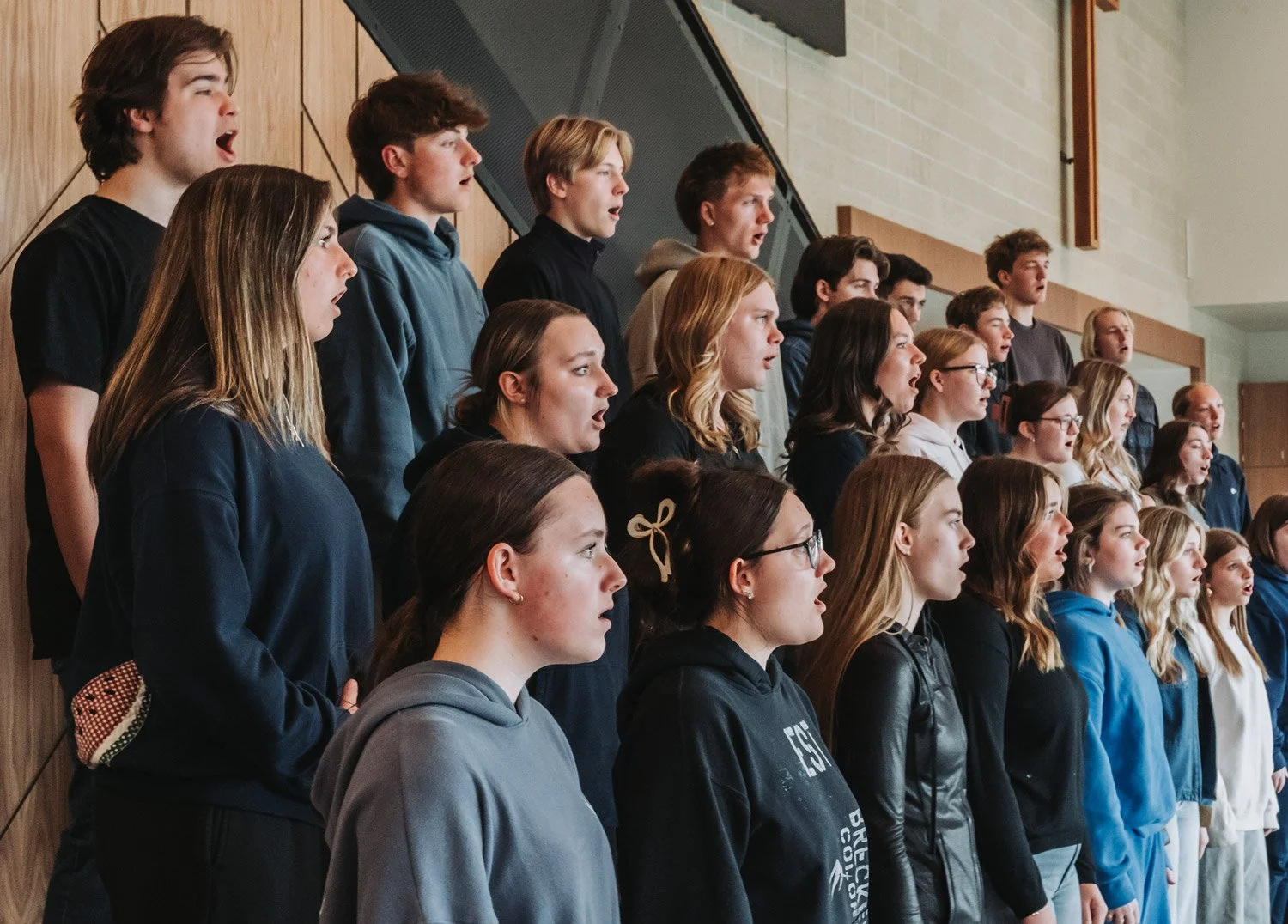 Trinity students singing in choir