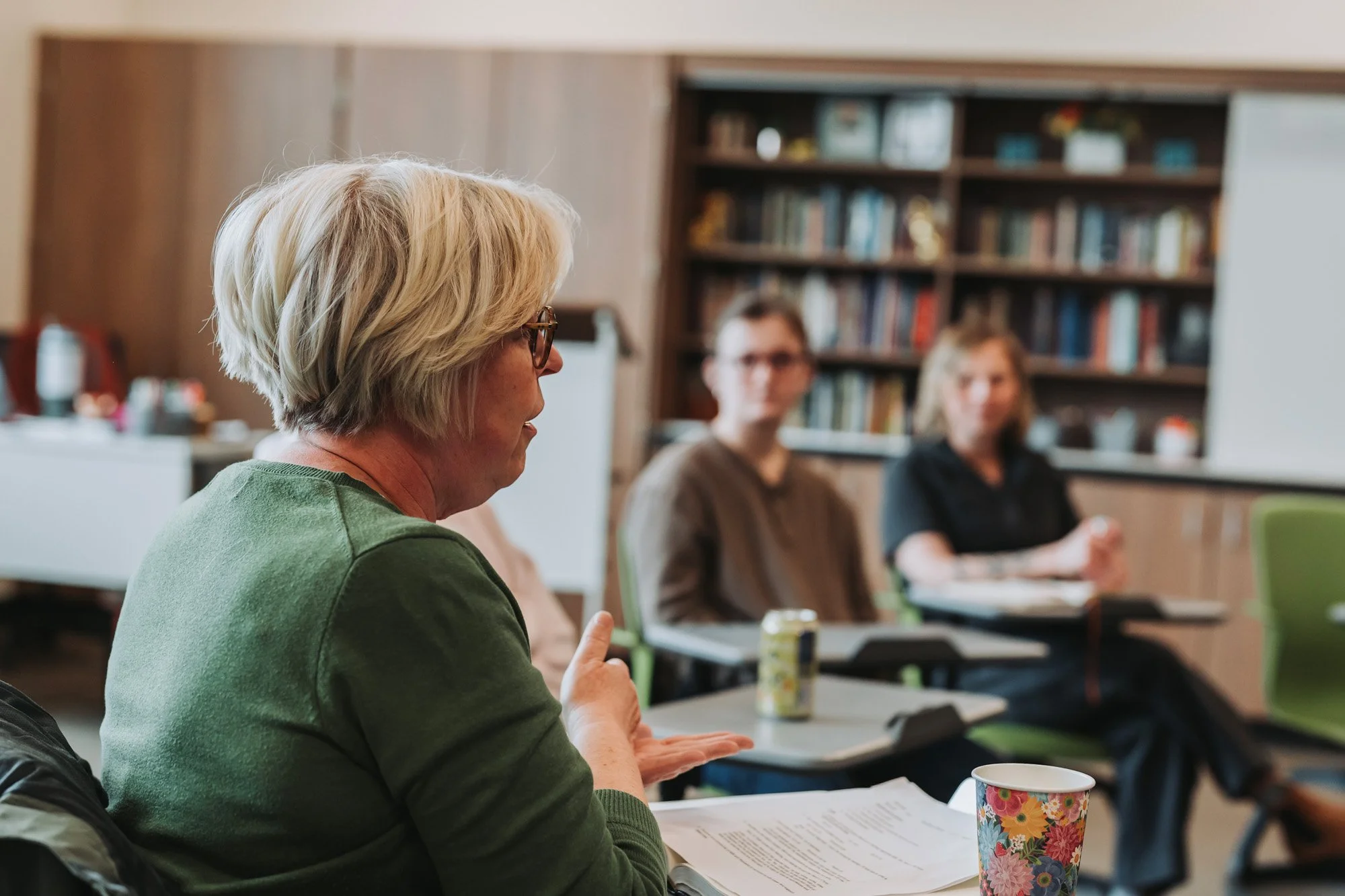 Teacher leading a discussion with students