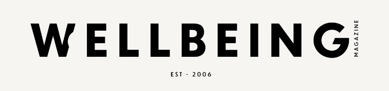 Cover of Wellbeing Magazine with bold black text on a white background, and smaller text indicating it was established in 2006.