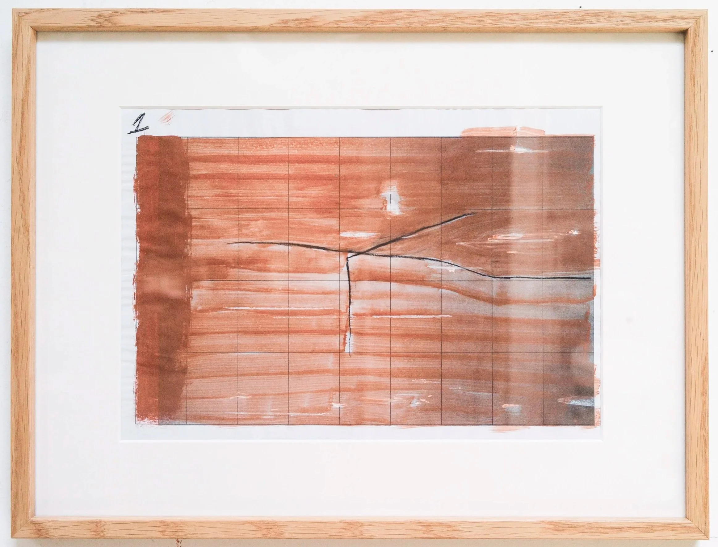 *Graffiti*, 2022. Encre et argile sur photographie / 32 x 42 cm (cadre inclus).