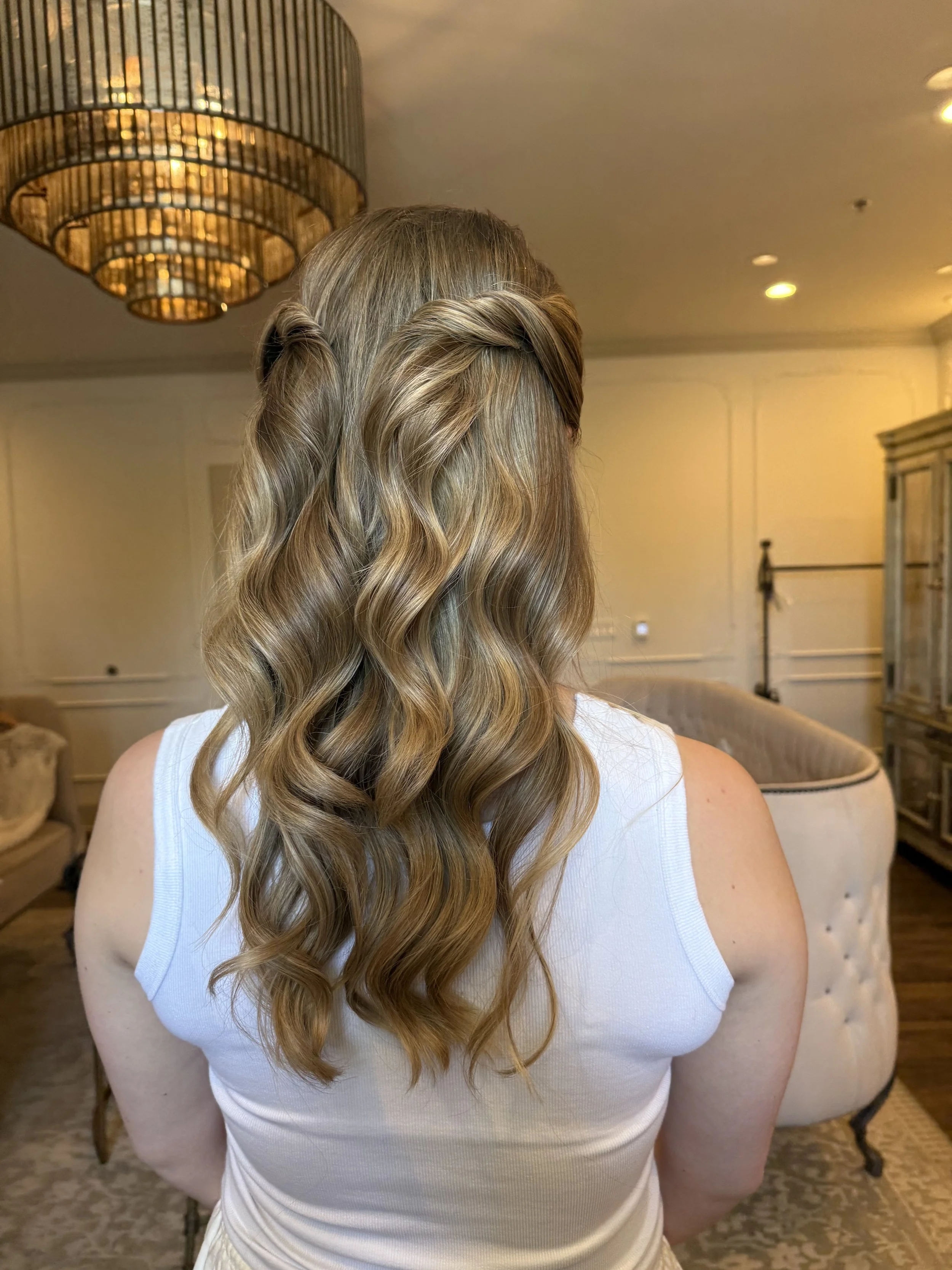 Bride with finished hair and soft glam makeup at a Rockford wedding