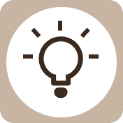 Icon of a light bulb with rays, symbolizing an idea or inspiration.