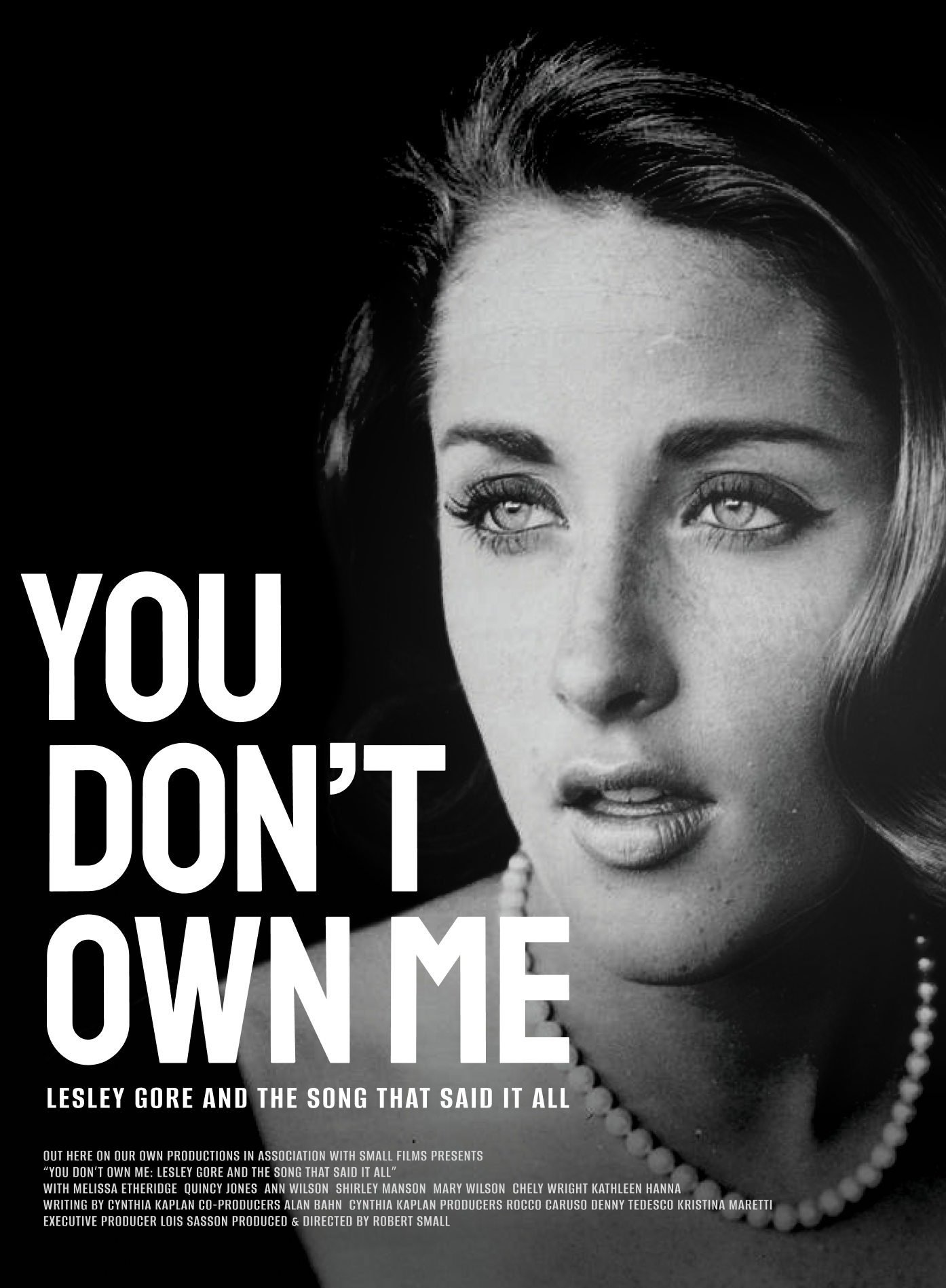 Black and white promotional poster featuring a close-up photograph of a woman with short hair and pearl necklace. Text on the left says 'You Don’t Own Me' and more details about the production in smaller font.