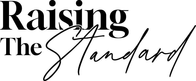 Black script text that reads "Standard" on a white background.