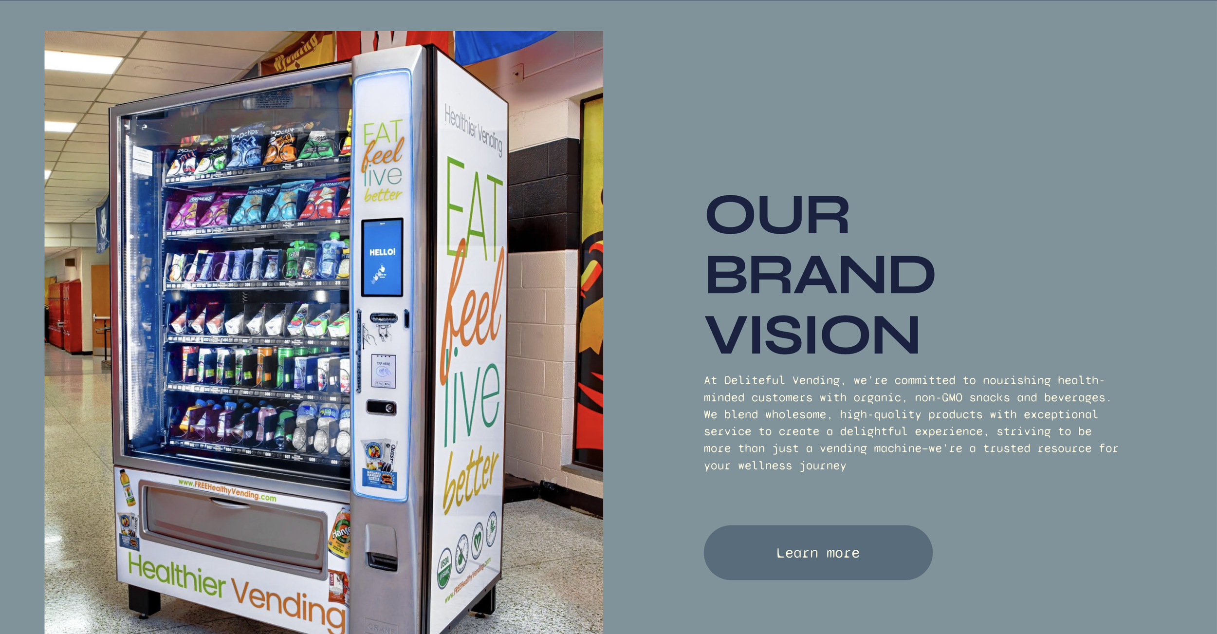 Vending machine offering organic, non-GMO snacks and beverages, with promotional slogans on the side and a website link, located in a school or public space.