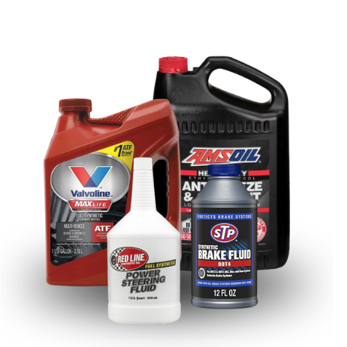 Collection of automotive fluids including Valvoline MaxLife, Red Line Power Steering Fluid, AMSOIL synthetic transmission fluid, and STP brake fluid.