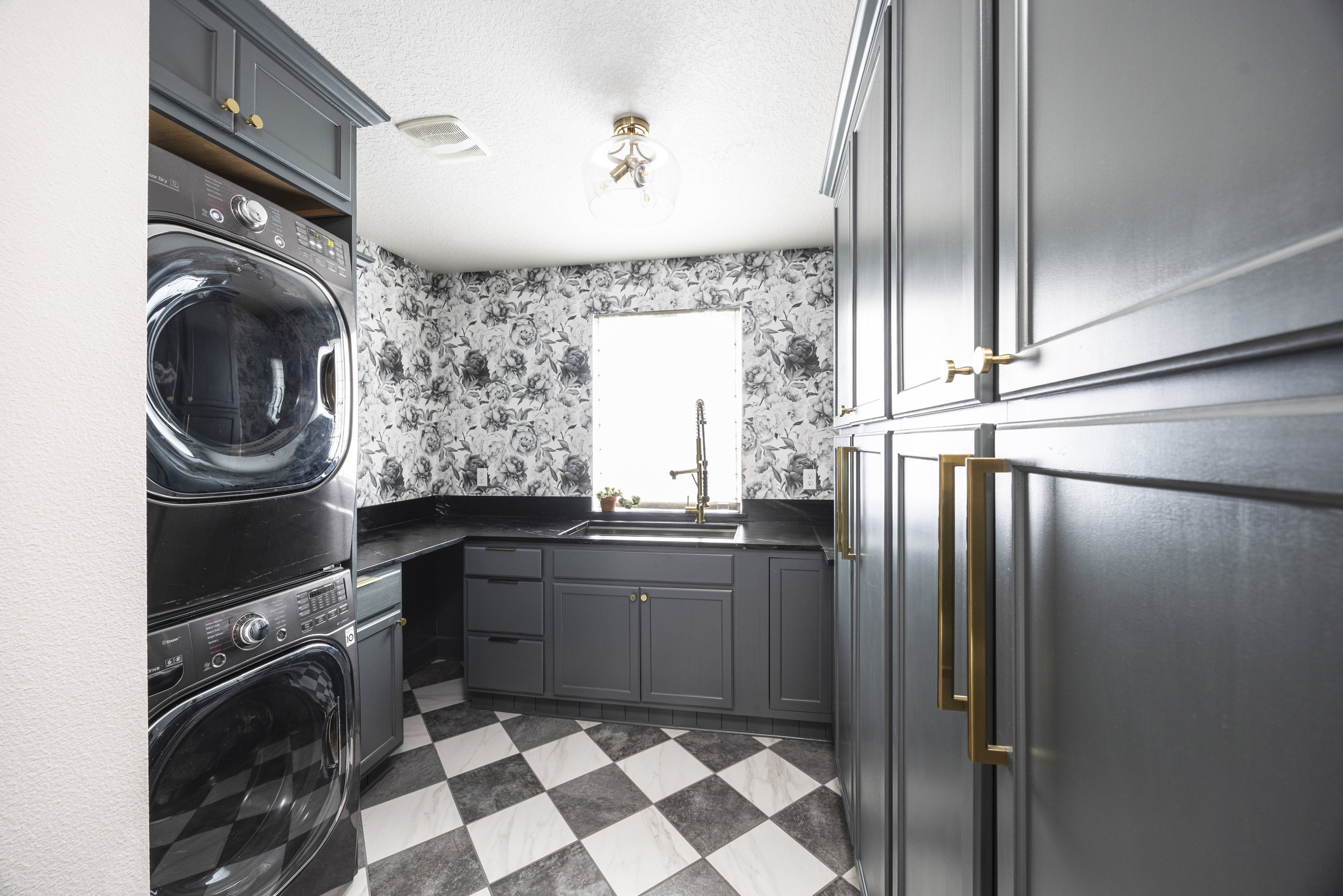 Mudroom with floral wallpaper, pewter green cabinetry, and checkered marble floor, Portland, Oregon