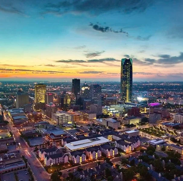 The Oklahoma City skyline at dusk, near the OVDI veterinary imaging clinic in Edmond, Oklahoma