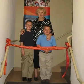 A teacher and two children