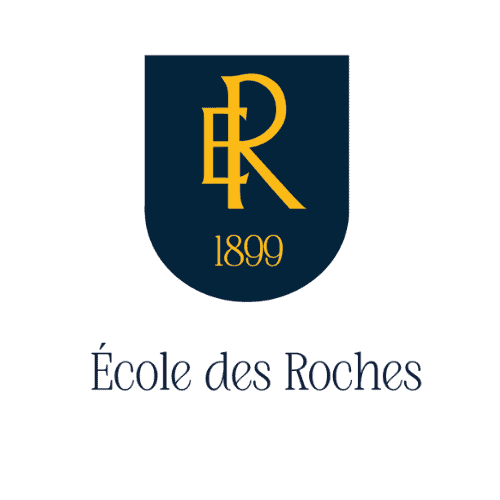 Logo of École des Roches with the initials ER and the year 1899 in gold on a navy shield, and the school's name below.