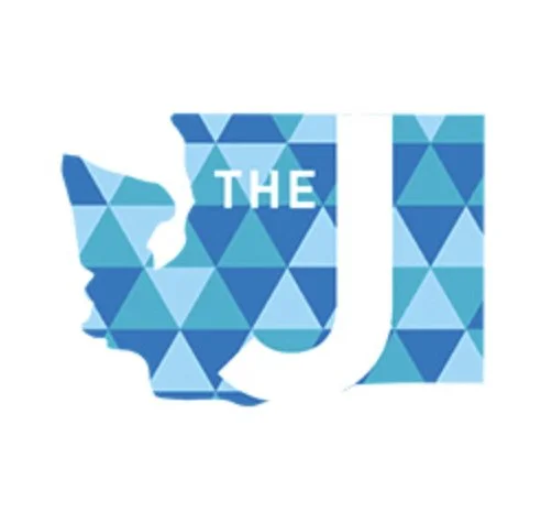 Map of Washington state with geometric blue triangles and the words "The J" in white.