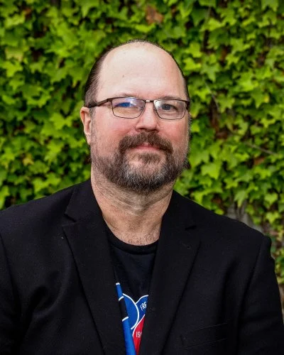 Headshot of Karl Archer, FASPS Director of Communications and Marketing.