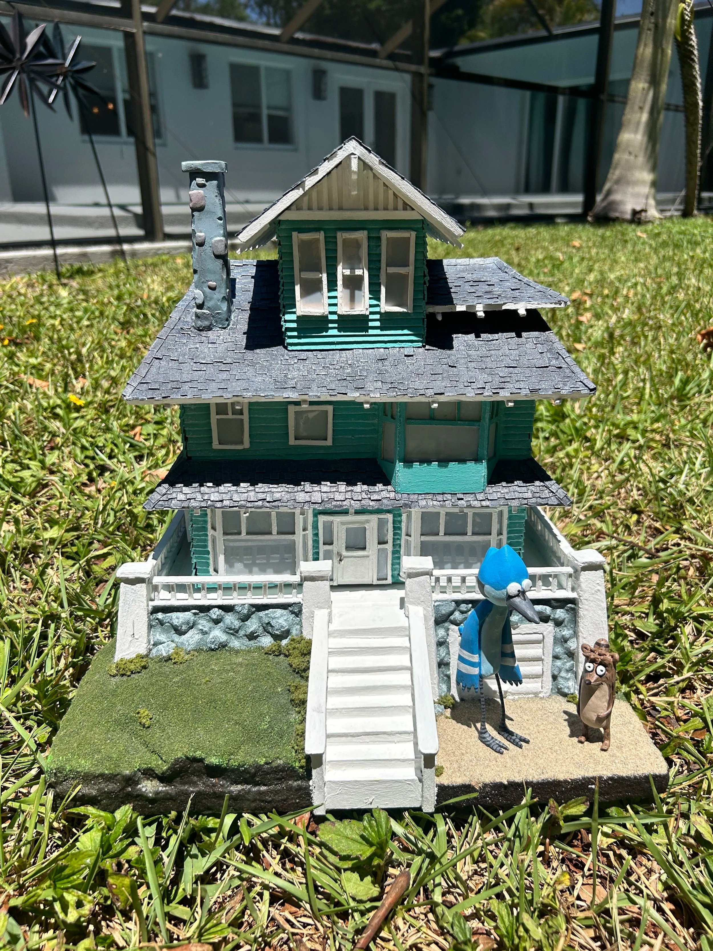 Diorama of the main house from cartoon ‘Regular Show’. (2026)

                    Mixed media: wood, paint, foam, modeling paste, oven-bake clay, acrylic paint. 