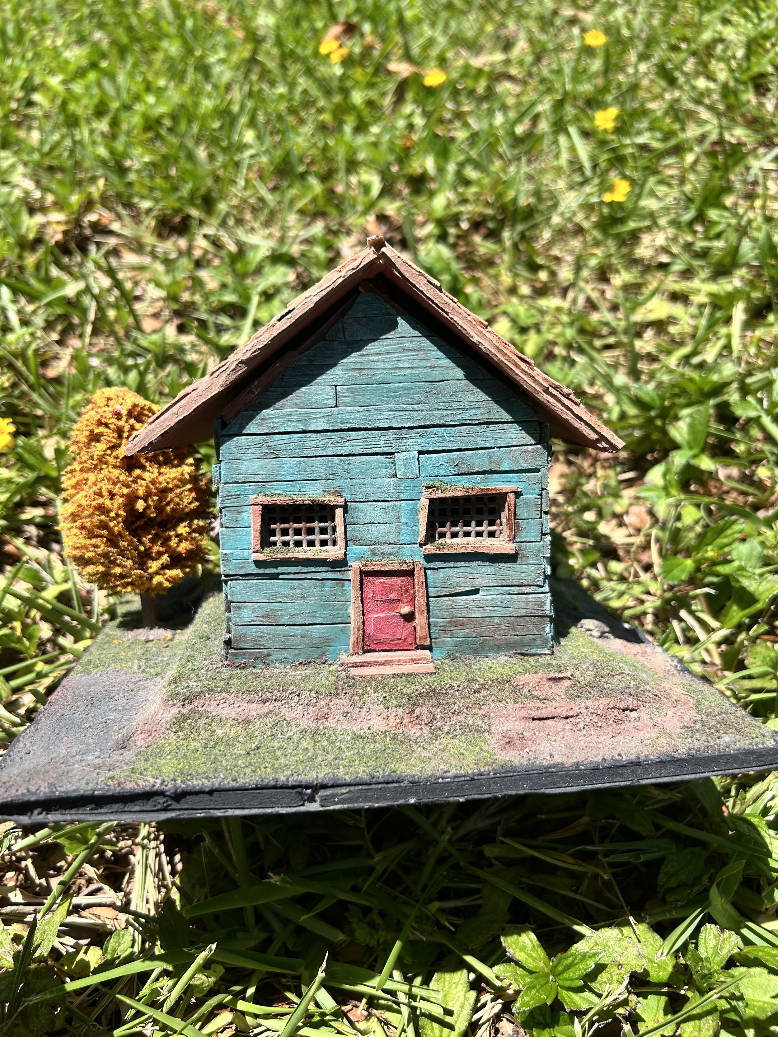 Small Cottage Diorama (2022)

Mixed Media: wood, paint, foam, modeling paste, oven-bake clay, acrylic paint. 