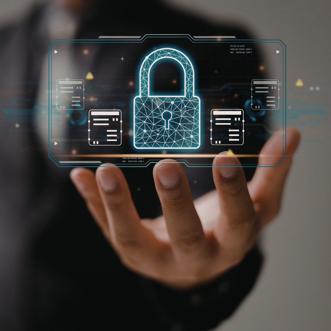 Person holding a smartphone with a digital hologram of a padlock and security icons, symbolizing cybersecurity or data protection.