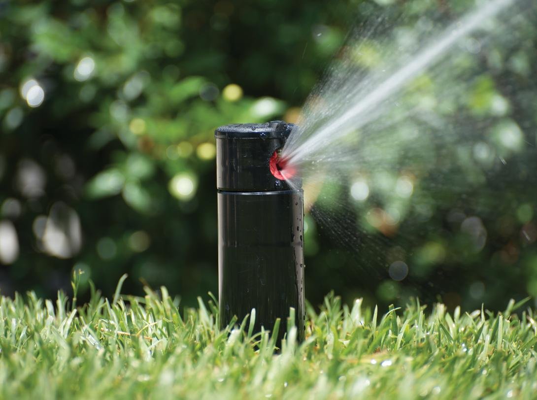 Brand new sprinkler head in irrigation system installed in Toronto, GTA
