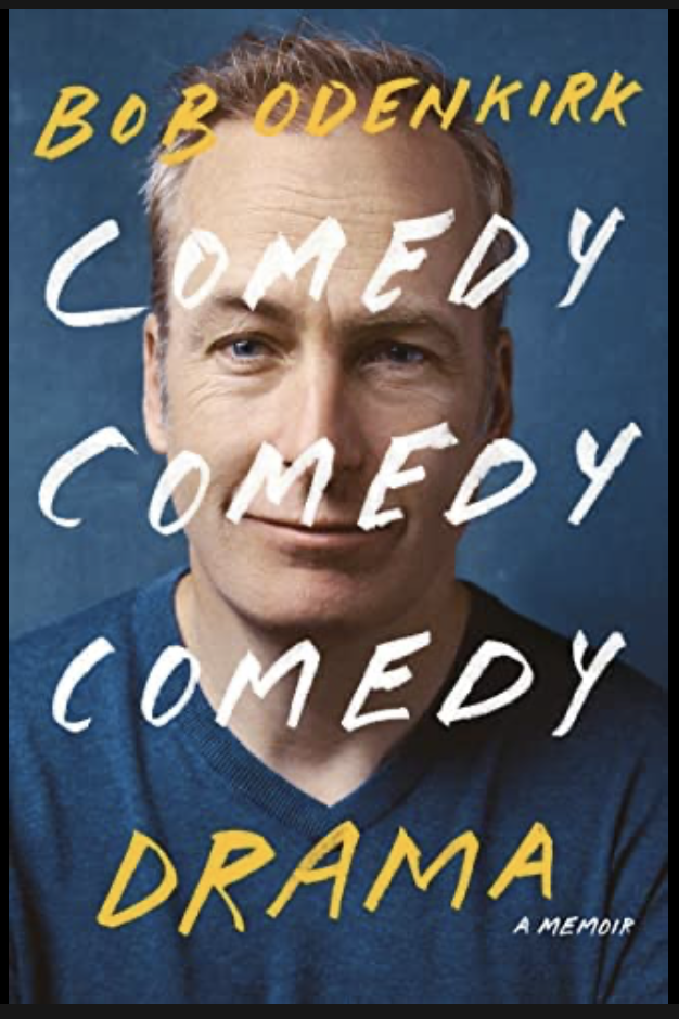 Book cover featuring a man with red hair and blue eyes, wearing a blue sweater, with the title 'Comedy Drama' and the author's name Bob Odenkirk.