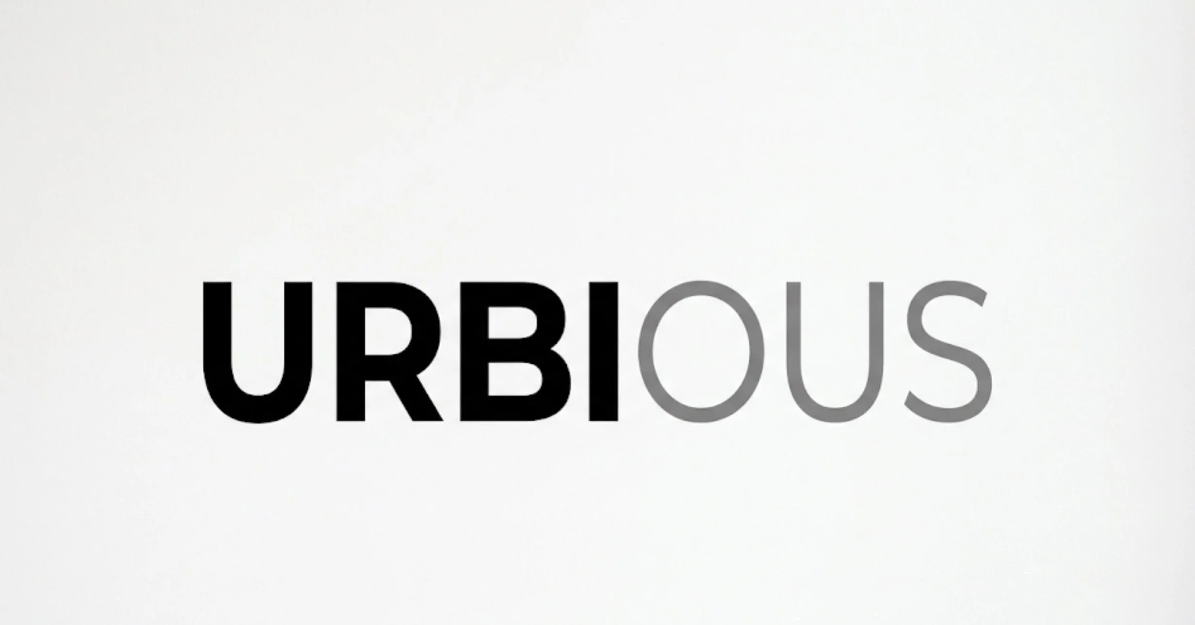 The word "URIOUS" with the first part in black and the second part in gray.