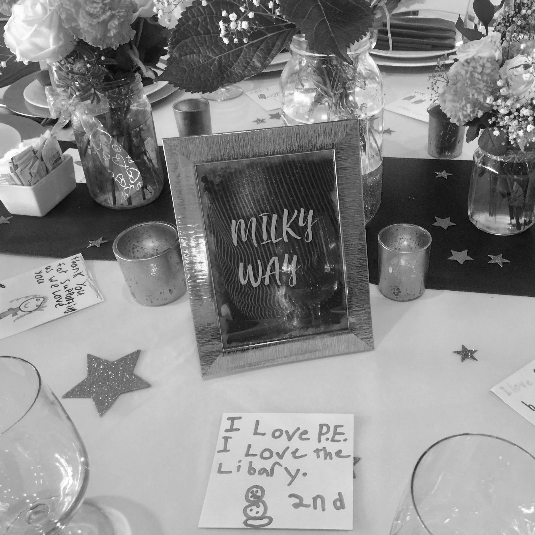 Picture of the table and letter from a second grader for the Encino Charter Elementary School Gala chaired by Allyssa DelPiano