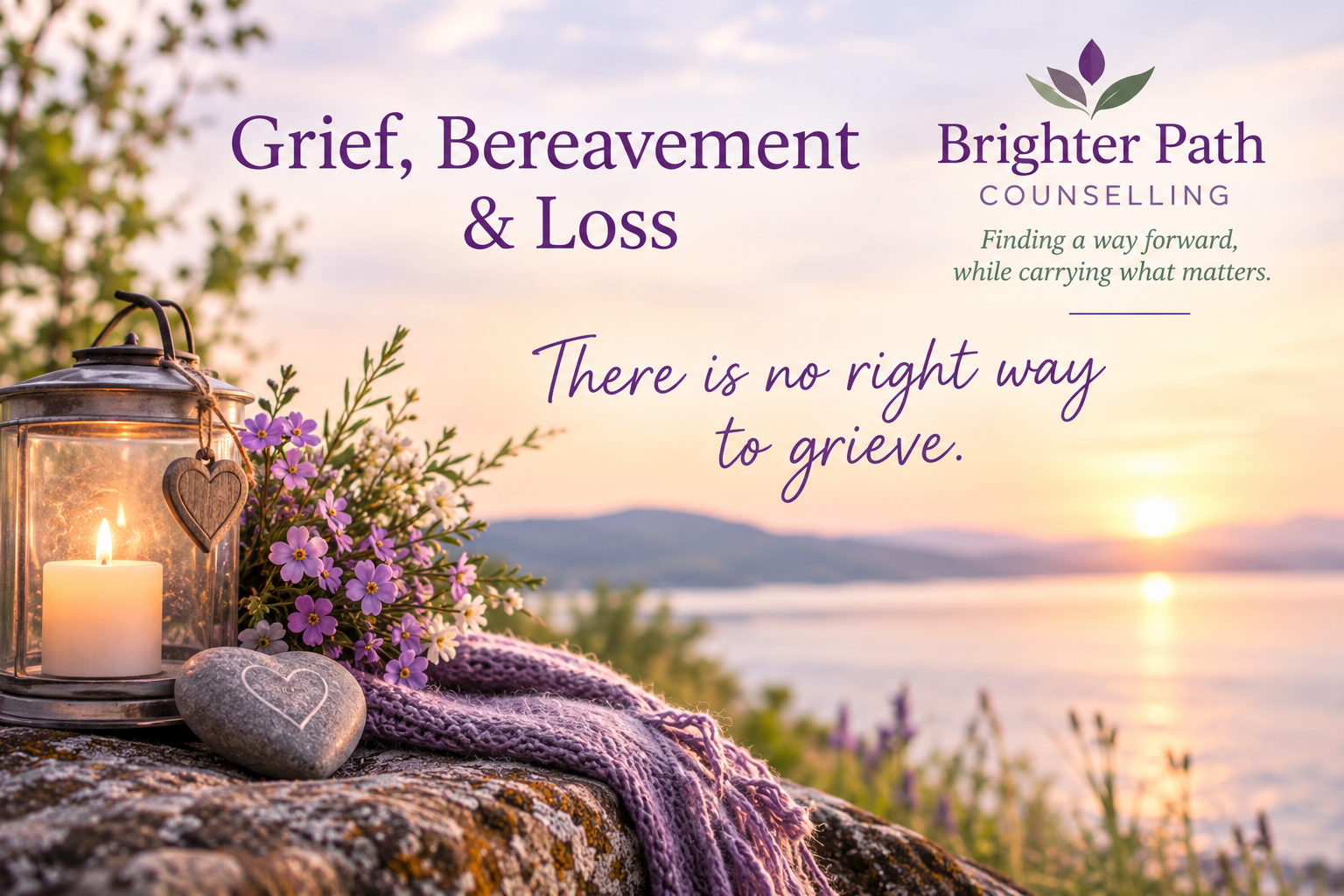 A sunset over a body of water with mountains in the background, a lantern with a lit candle, purple flowers, a heart-shaped stone, and a purple knitted cloth in the foreground, along with text about grief and loss.