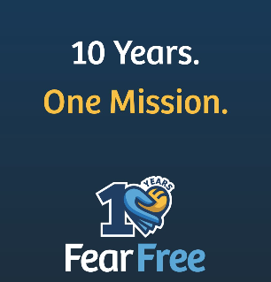 Celebration of 10 years of Fear Free, featuring a logo with a handshake, the number 10, and a ribbon, with the text '10 Years. One Mission.' on a dark blue background.