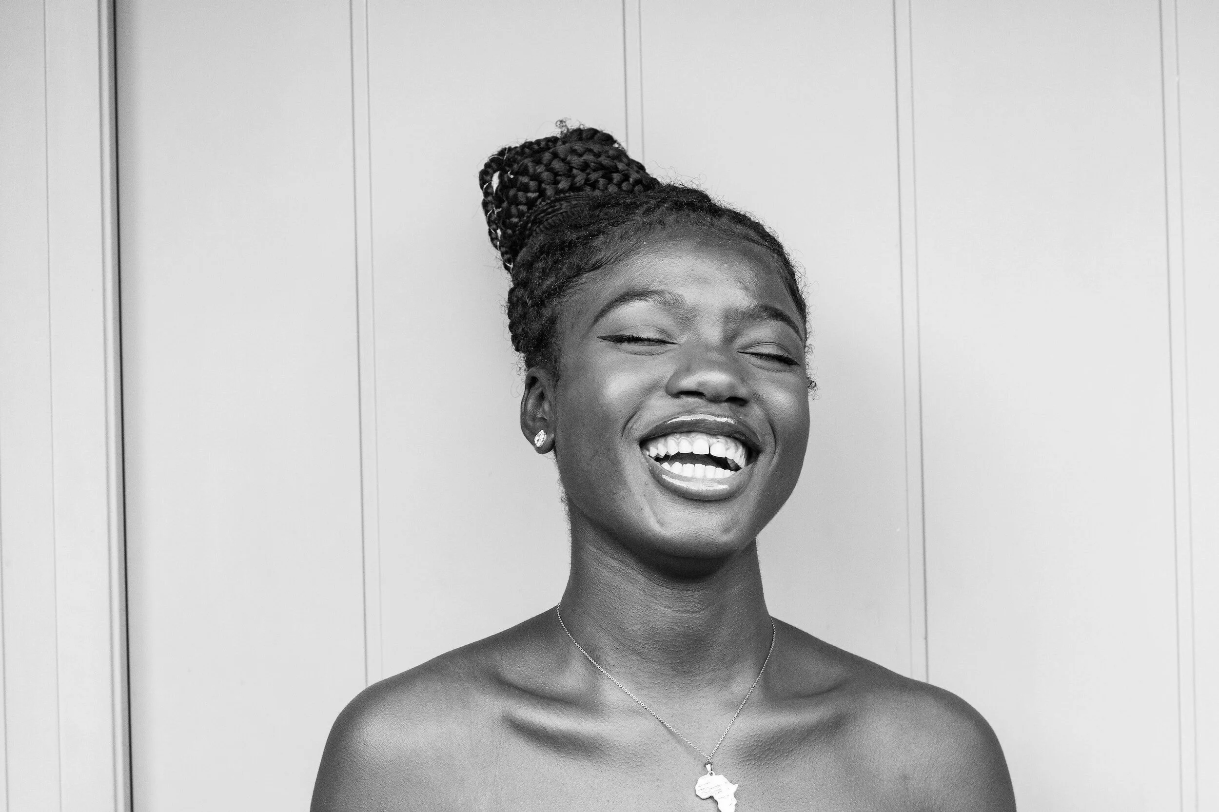 Radiant 19-year-old expressing joy through smile